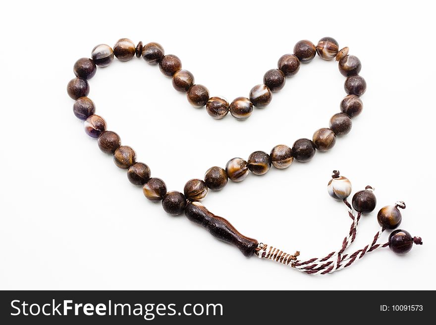 A brown beads, normally used in for a religious matter