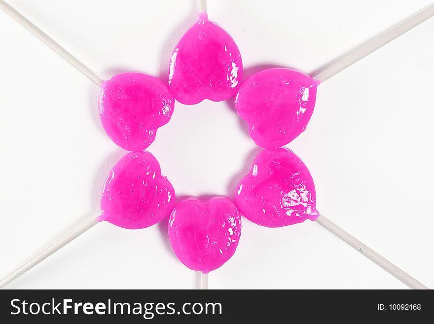 Star heart pink lollipops isolated