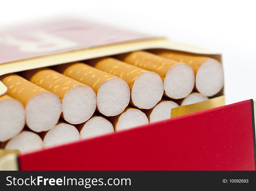 Single or pack of cigarettes with white background