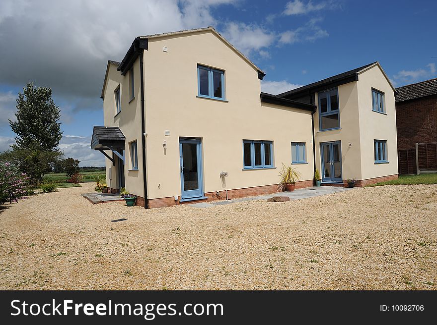 A newly built modern home, part of a large property development. A newly built modern home, part of a large property development