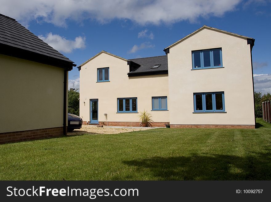 A newly built modern home, part of a large property development. A newly built modern home, part of a large property development