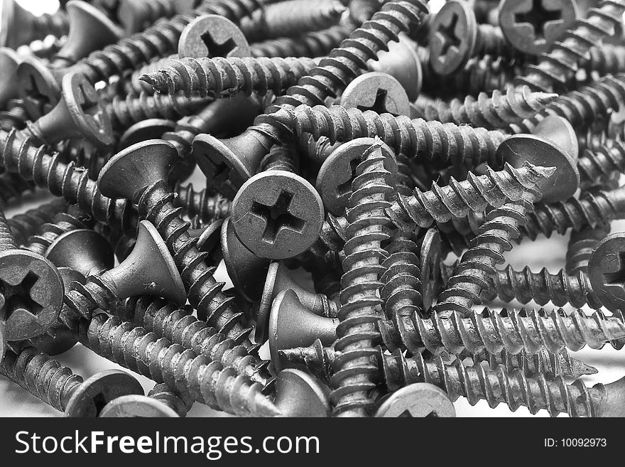 Screws and driver assorted with white background. Screws and driver assorted with white background