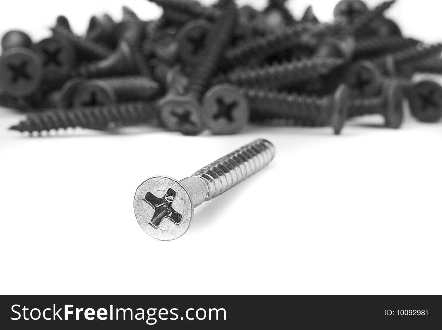 Screws and driver assorted with white background. Screws and driver assorted with white background