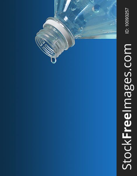Water flows from  bottle on  blue background. Water flows from  bottle on  blue background