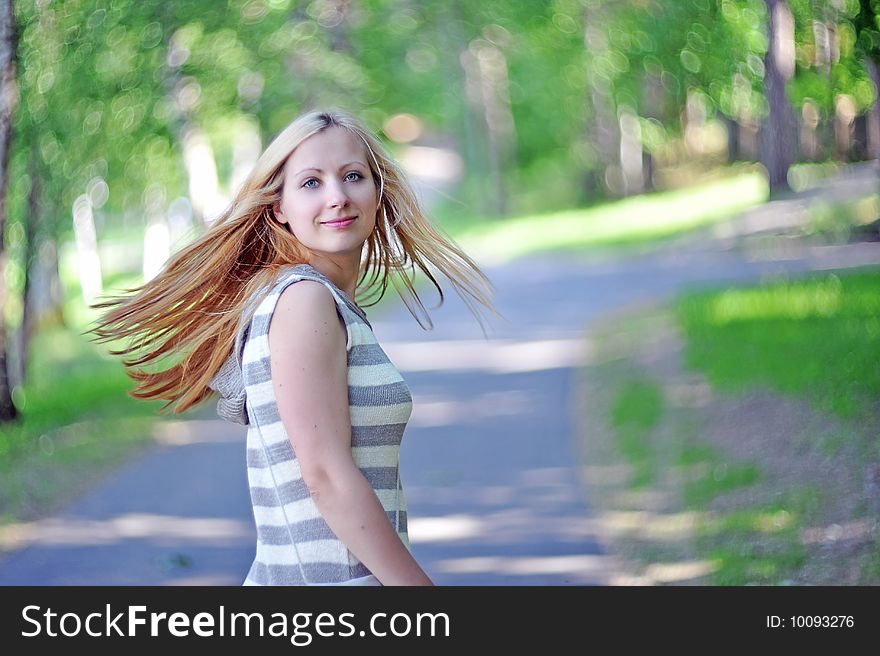 Beautiful young woman in park  portrait