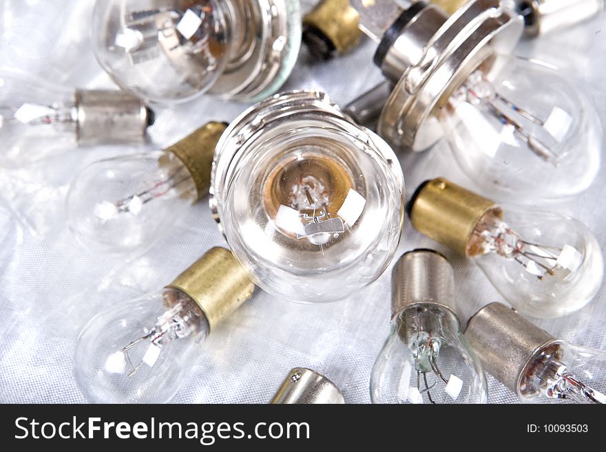 Light bulb on silver background