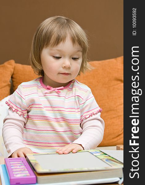 Sweet toddler baby girl playing puzzle. Sweet toddler baby girl playing puzzle