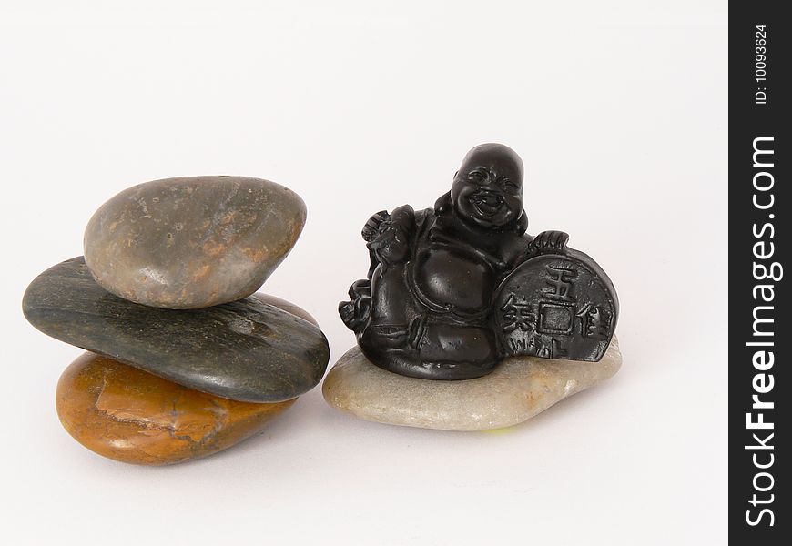 This is a photo of Buddha statue and stones
