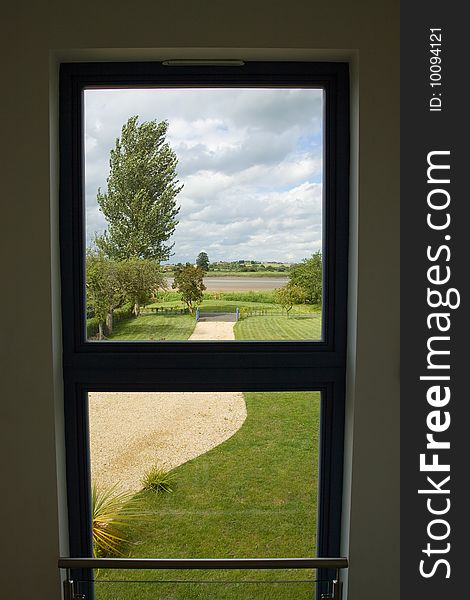 A modern staircase in a newly built property with countryside views. A modern staircase in a newly built property with countryside views