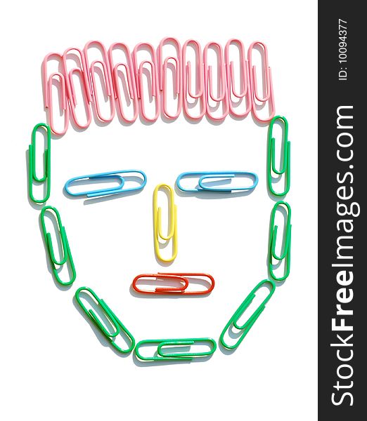 Colored paper clips in the shape of head. Colored paper clips in the shape of head