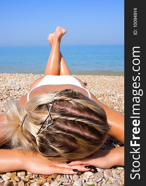 Sexual Young Girl Relaxing On A Beach