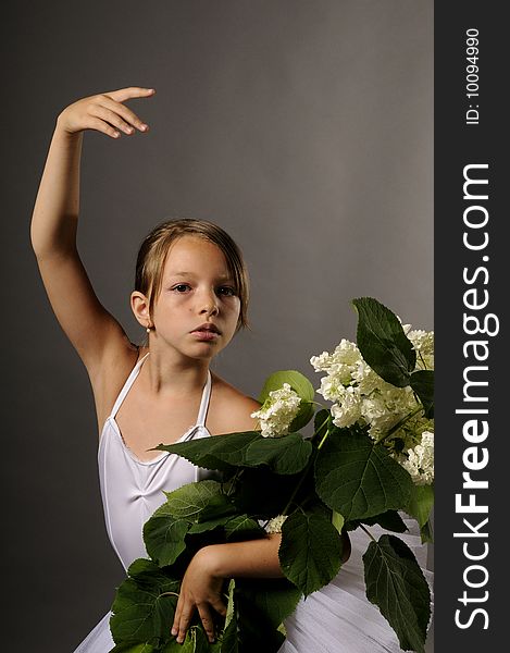 Portrait of beautiful ballerina with white flowers. Portrait of beautiful ballerina with white flowers