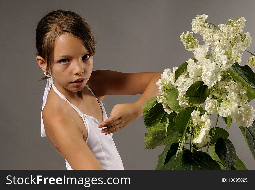 Portrait of beautiful ballerina with white flowers. Portrait of beautiful ballerina with white flowers