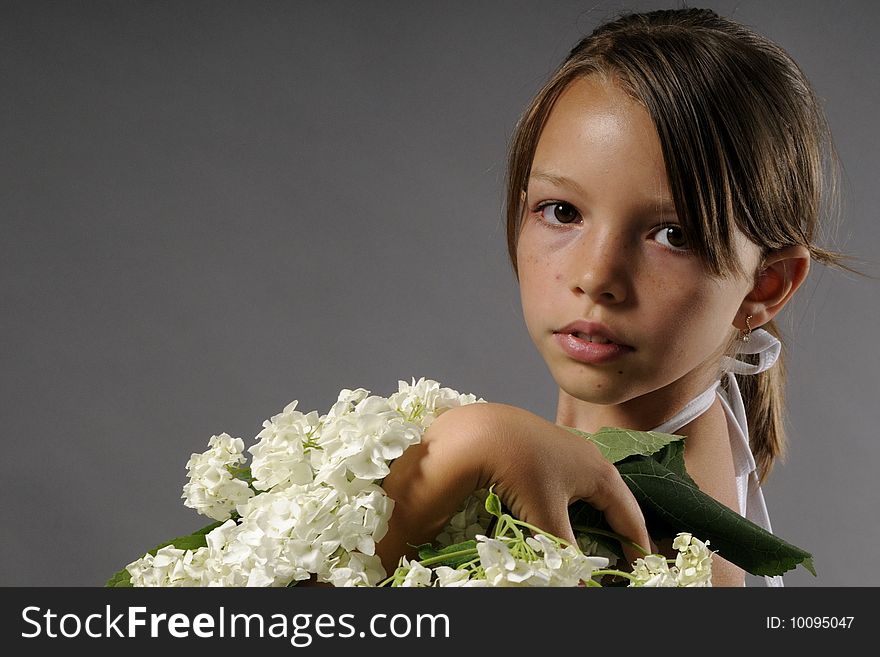 Portrait of beautiful ballerina with white flowers. Portrait of beautiful ballerina with white flowers