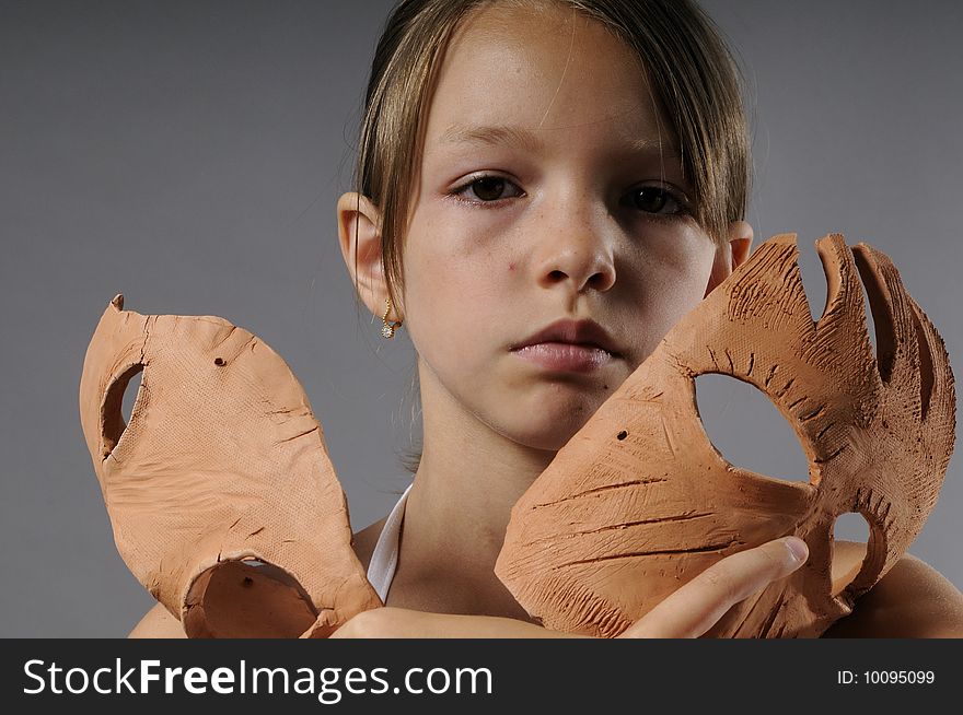 Close up with mask on a young girl face