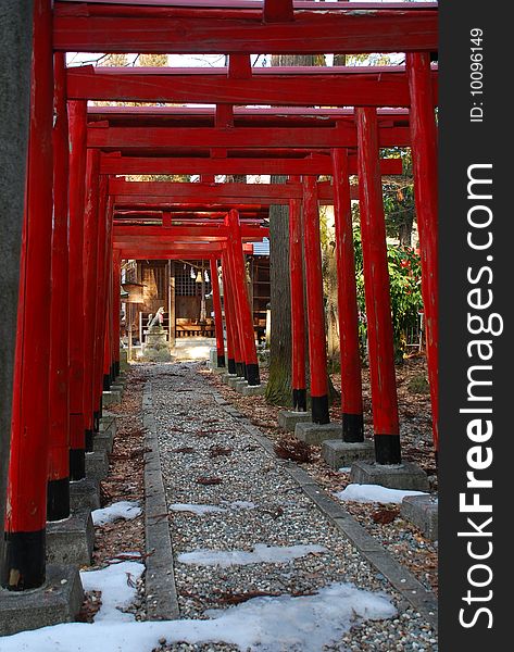 Sacred tori way to a temple in Takayama, Japan. Sacred tori way to a temple in Takayama, Japan