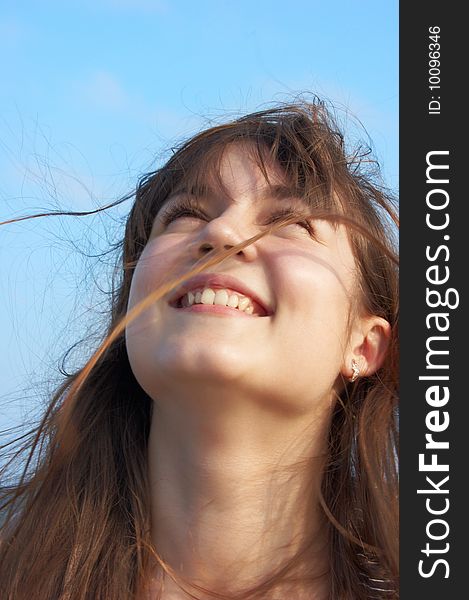 Women's portrait on sea background