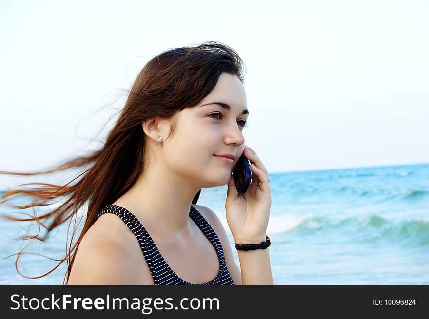 Women's portrait on sea background