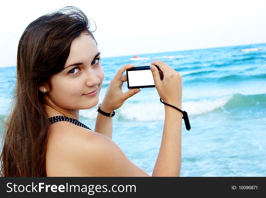 Women's portrait on sea background