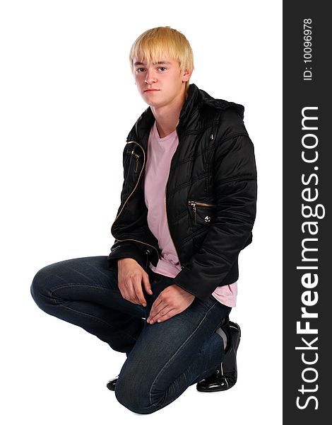 Young Man In Jacket Sits