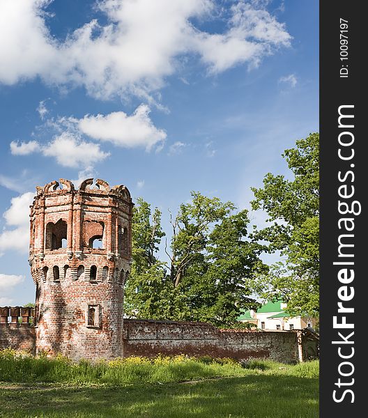 Ruined tower made of red bricks