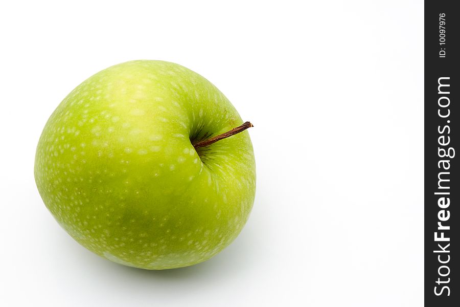 Ripe green apple on a white background. Ripe green apple on a white background
