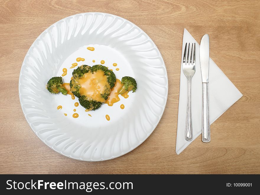 A meal made for someone who is on a diet, consisting of broccoli and cheese.