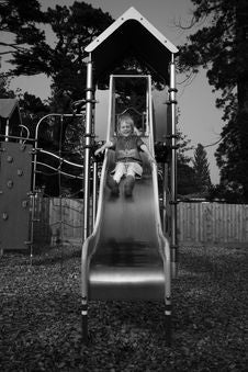 Child On Slide Royalty Free Stock Photos Child On Slide Royalty Free Stock Photos