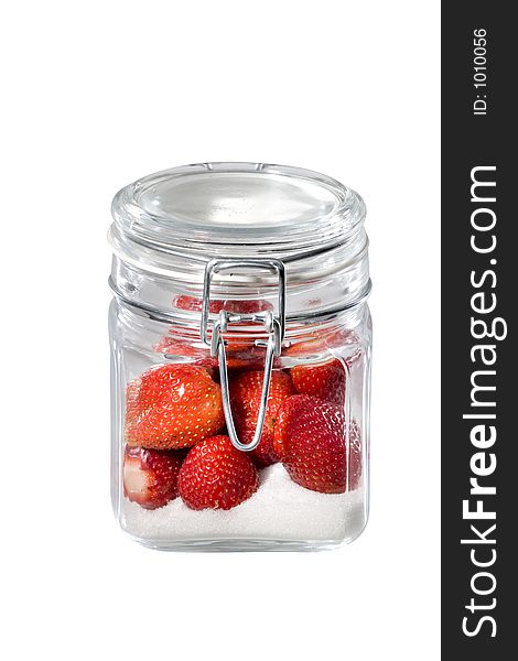 Strawberries in the jar on white