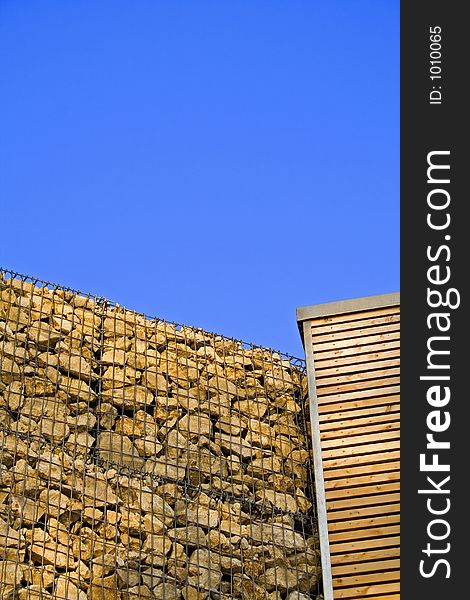 Stone wall and wooden front