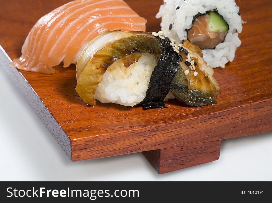 Sushi on wooden plate. Sushi on wooden plate