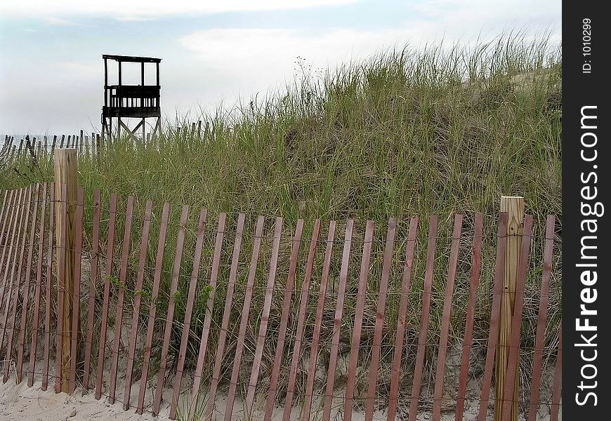 Fence and lifeguard station on Cape cod, Massachusetts. Fence and lifeguard station on Cape cod, Massachusetts