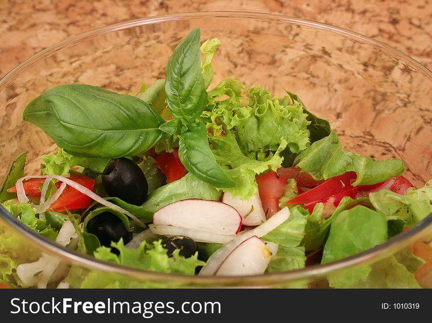 Salad bowl with fresh salad and tomato. Salad bowl with fresh salad and tomato