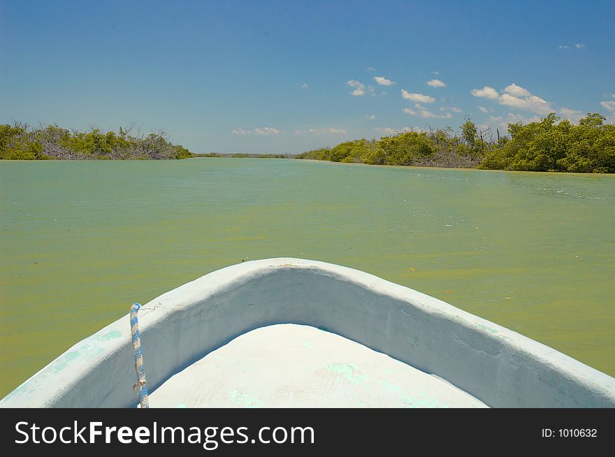 Boat on the river in Rio Lagartos, Mexico