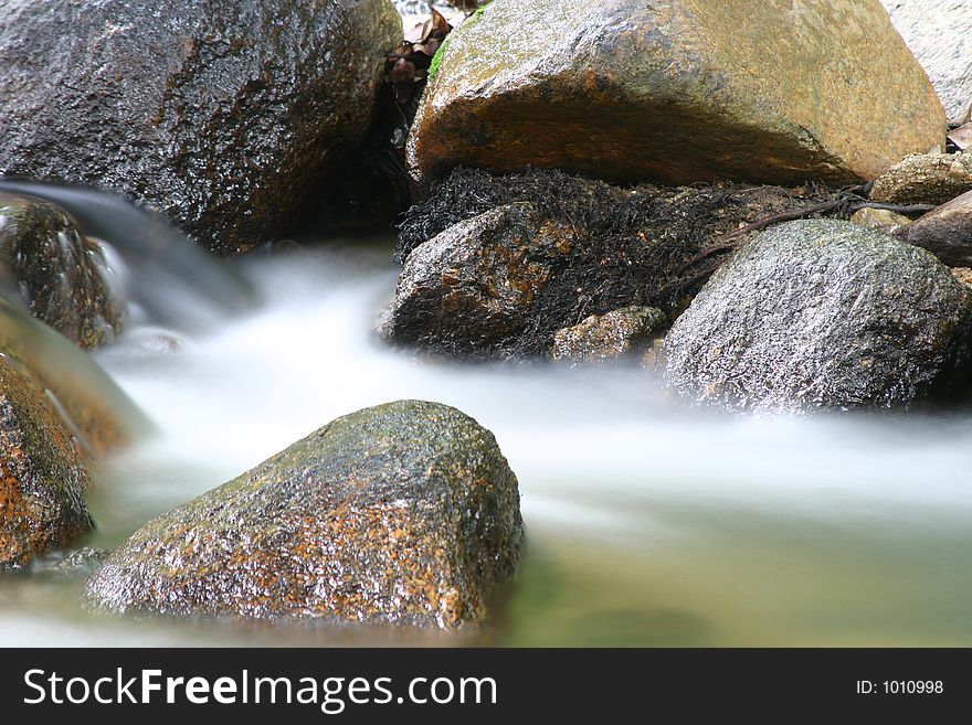 Water flowing down a stream. Water flowing down a stream