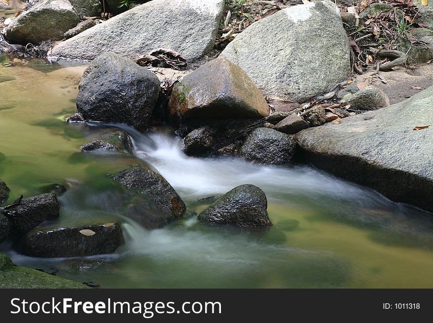 Water flowing down a stream. Water flowing down a stream