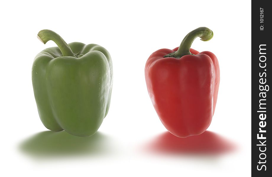 Red and green pepper isolated on white
