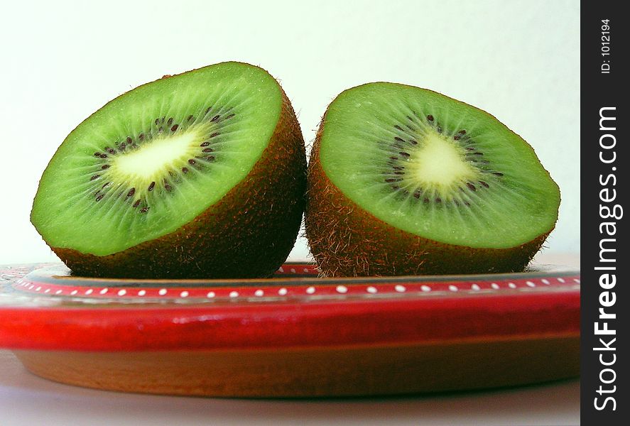 Kiwi on a red plate