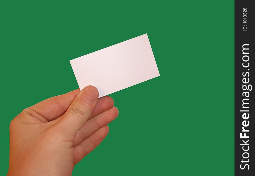 Isolated empty white blank card ready for text on green background. Isolated empty white blank card ready for text on green background