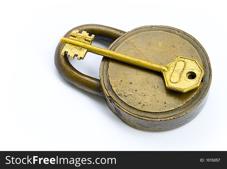 Vintage Lock And Key Isolated Over White. Vintage Lock And Key Isolated Over White