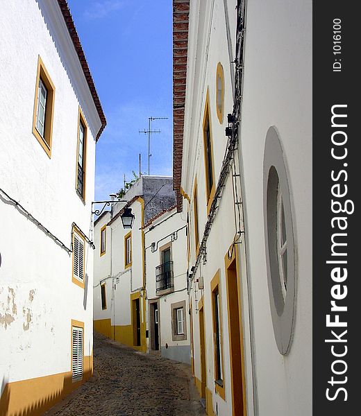 Street of the city of Évora capital of the Alentejo region to the South of Portugal, considered patrimonio of the Humanity for UNESCO since 1986. Street of the city of Évora capital of the Alentejo region to the South of Portugal, considered patrimonio of the Humanity for UNESCO since 1986.