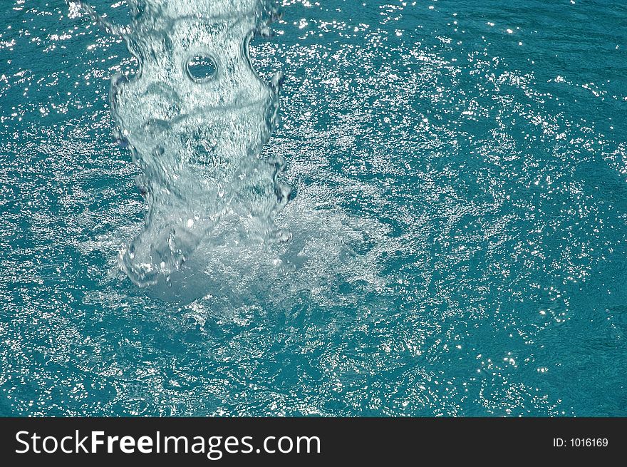 Swirl and waterfall in a swimming pool