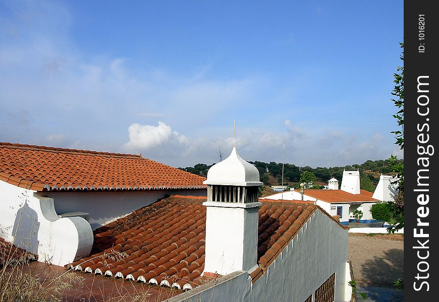Landscape with roofs and tipics chimneys of the Alentejo region in the south of Portugal.