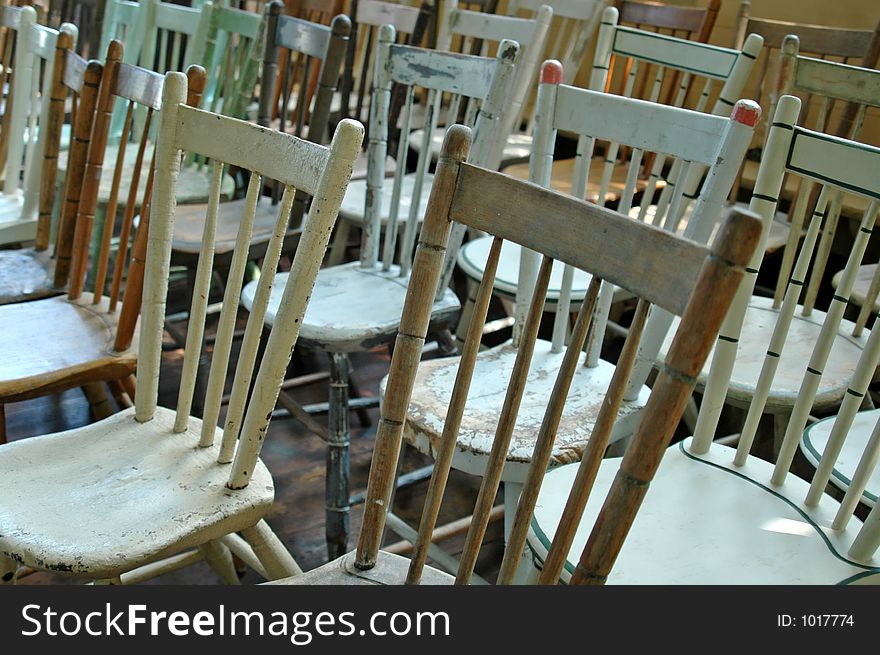 Rows of antique chairs.