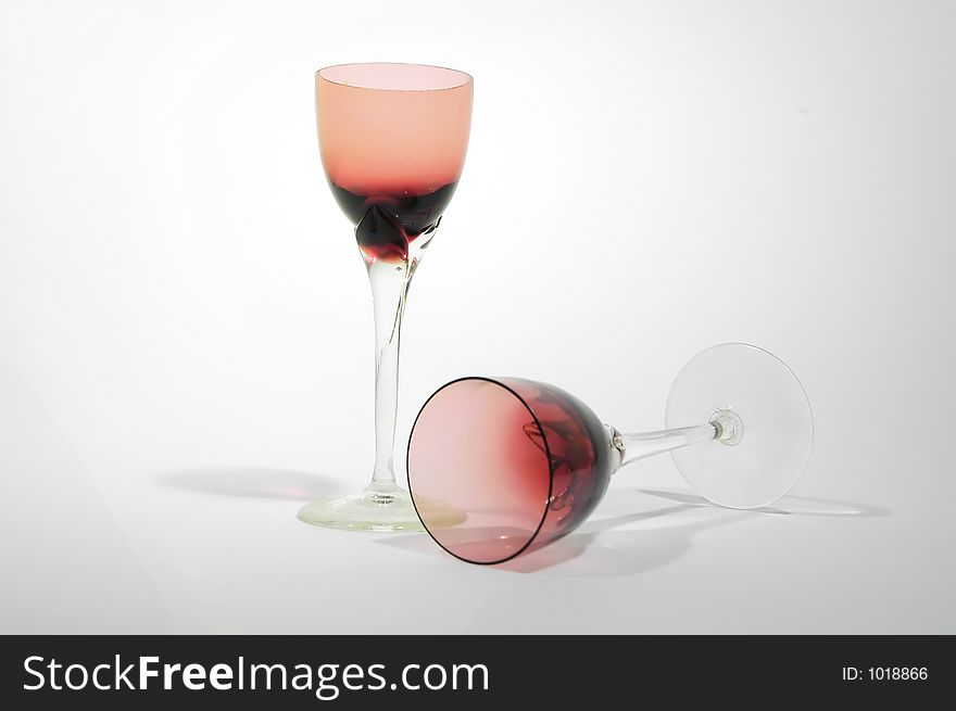 Red glasses for wine with spot light and soft filter. Red glasses for wine with spot light and soft filter