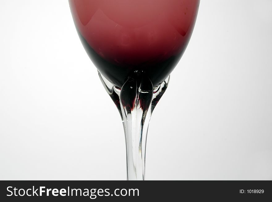 Detail of red glass for wine with spot light. Detail of red glass for wine with spot light