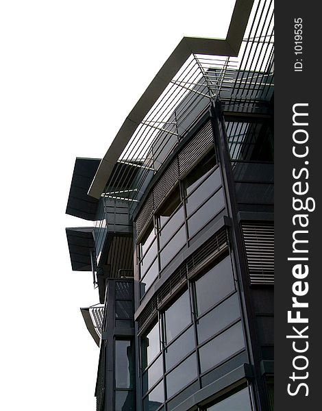 Detail of top floors of contemporary style office building. Isolated. Detail of top floors of contemporary style office building. Isolated.