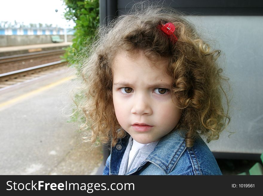 Little girl's expression: anger for the long waiting