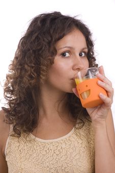 Girl Is Drinking Orange Juice. Stock Image Girl Is Drinking Orange Juice. Stock Image