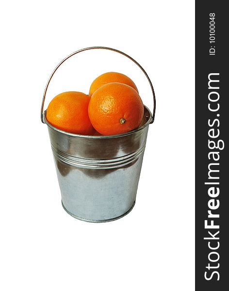 Bucket full of oranges isolated on white background. Bucket full of oranges isolated on white background